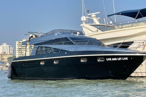 Ambassador 47 Motor Yacht on Charter in Mumbai at Gateway of India